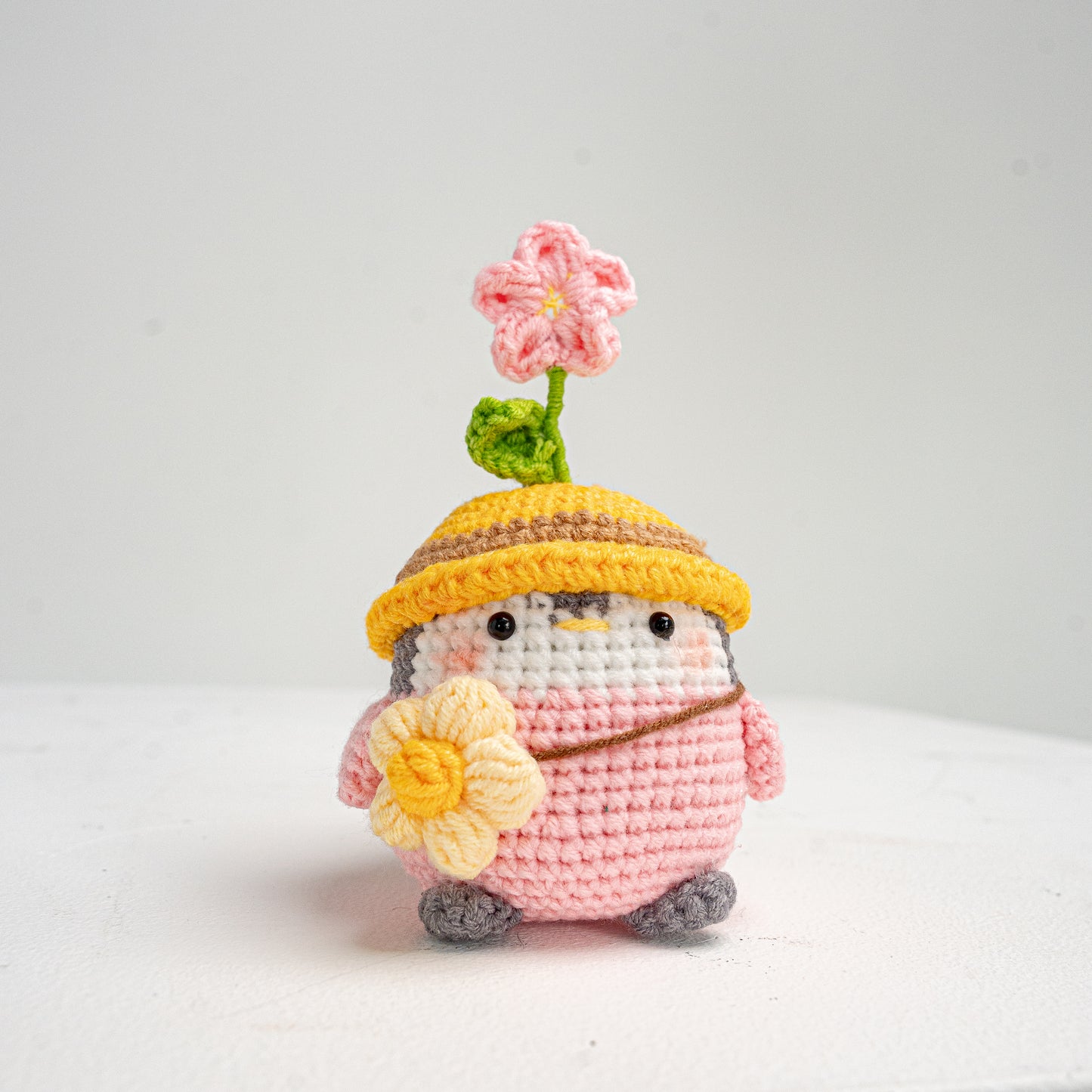 Penguin with flower hat crochet keychain