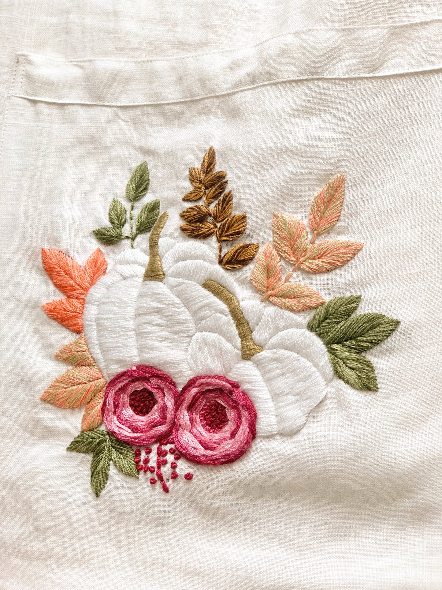 Hand embroidered linen tote bag with pumpkin design