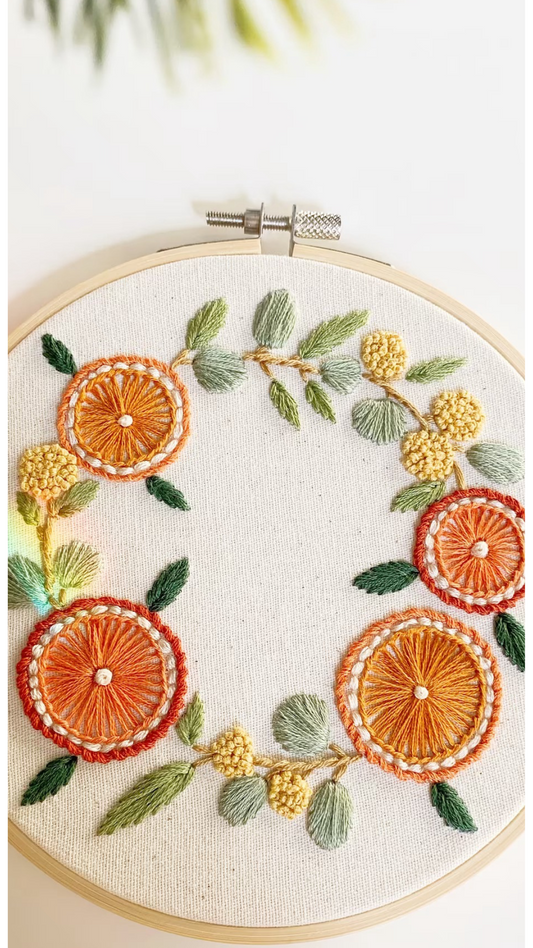 Handmade linen tote bag with beautiful orange eucalyptus wreath embroidery.